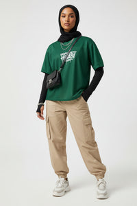 Green Unapologetic Hijabi Boxy football jersey - Modestly Vogue 
